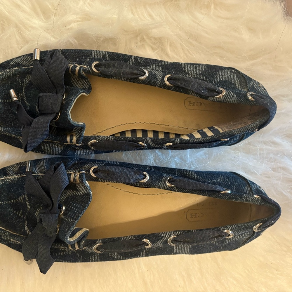 Coach Blue Flats with Glossy Finish and Metal Accents